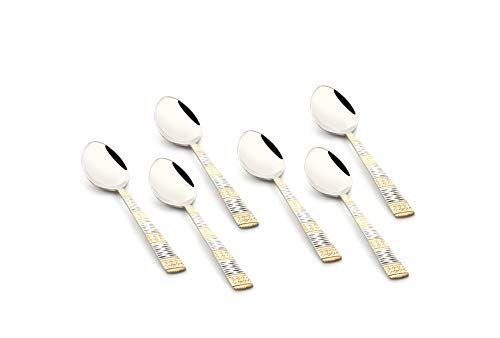 Set of six stainless steel baby spoons with ornate silver-gold patterned handles on white background.