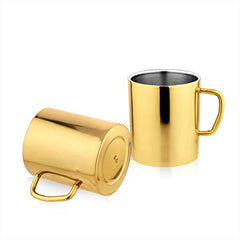 Set of 2 FNS gold mirror finish stainless steel coffee mugs shown upright and tilted on white background displaying the silver interior and base