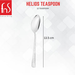 Single Helios teaspoon displayed vertically with 13.5 cm measurement indicator, showing mirror-finish bowl and textured handle design on white background.