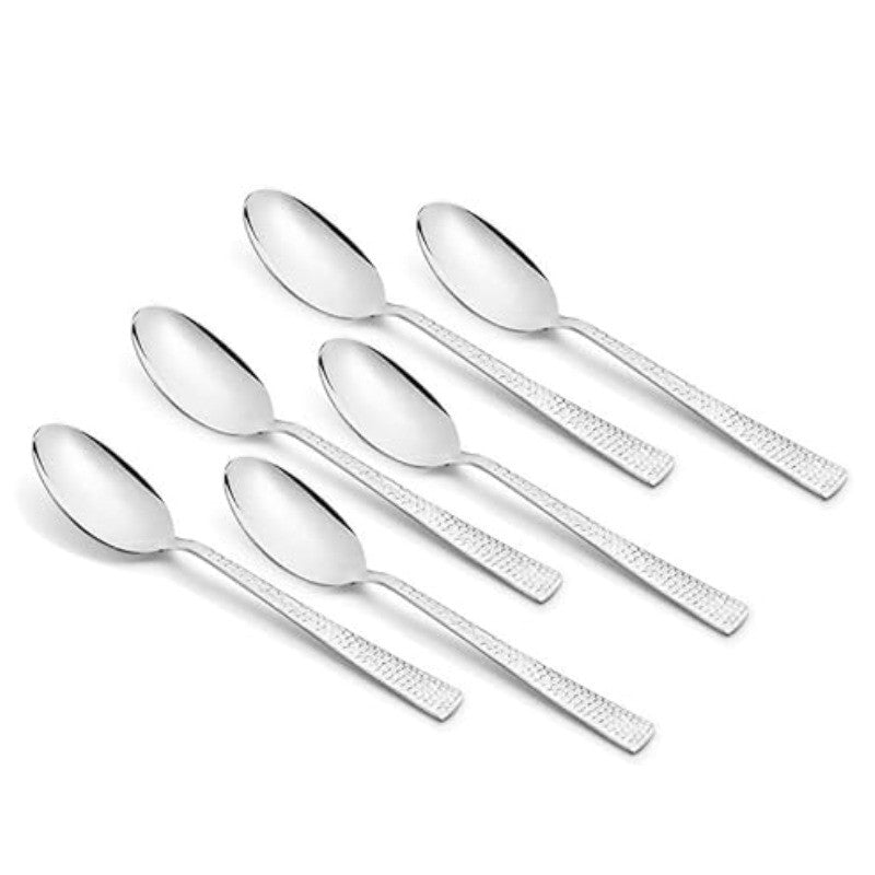 Six stainless steel teaspoons with textured handles arranged in two rows on white background, showing mirror finish and matching design pattern.