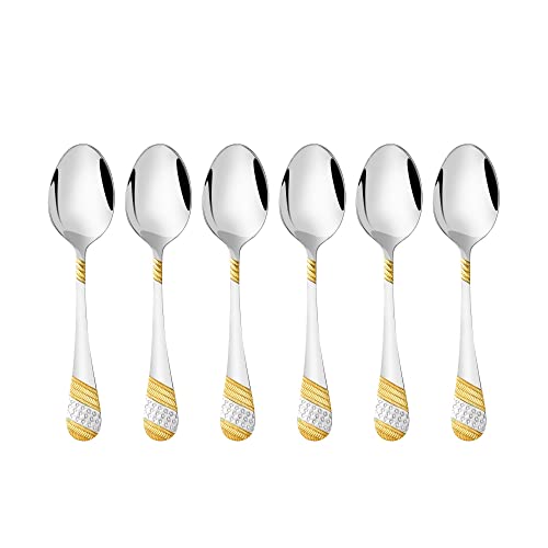 Six FNS Imperio dinner spoons with mirror polished stainless steel bowls and luxurious 24 karat gold plated geometric textured handles on white