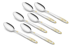 Set of six elegant teaspoons with mirror-finish bowls and decorative gold-tone handles displayed in two rows on white background, showing matching design.