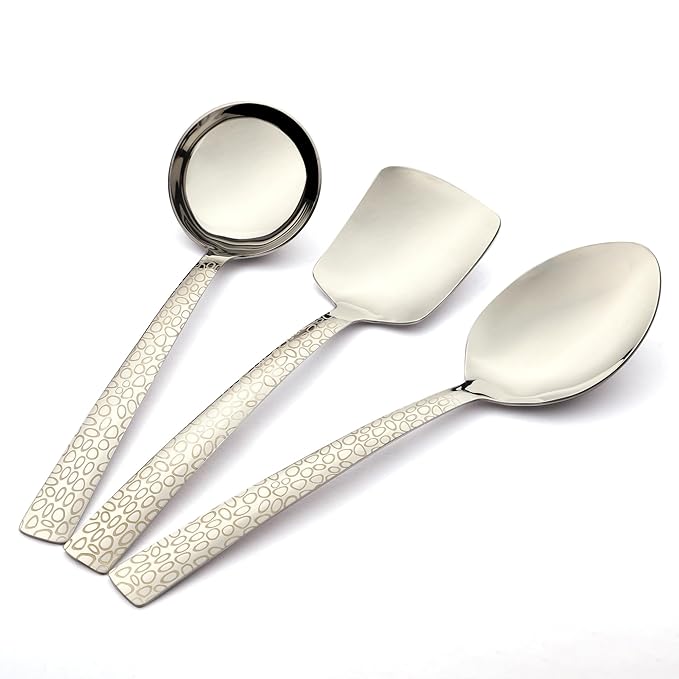 FNS Pebble serving spoon set showcasing mirror polish finish and intricate laser engraved pebble pattern on handles
