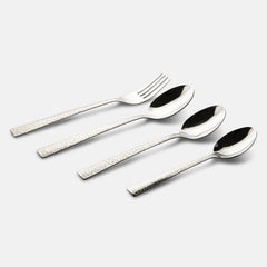 Fork and three spoons with elegant embossed handles arranged diagonally on a minimal grey background.