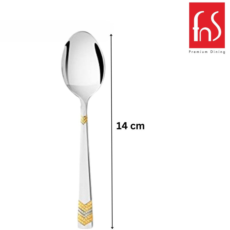Single stainless steel teaspoon with gold chevron pattern on handle shown vertically with 14 cm measurement line, FnS Premium Dining logo in corner