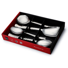 FNS Rhombo 4-piece serving spoon set displayed in premium red and black gift box packaging with window display