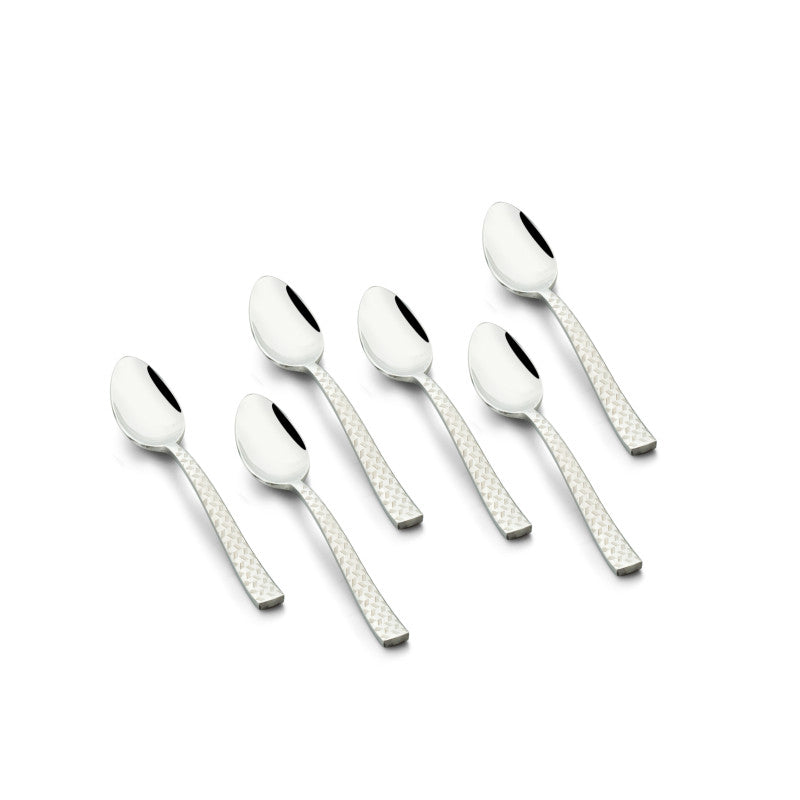 Six-piece FNS Rhombo stainless steel dinner spoon set arranged on white background, featuring distinctive diamond textured handles and mirror finish for modern dining.
