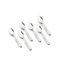 Six-piece FNS Rhombo stainless steel dinner spoon set arranged on white background, featuring distinctive diamond textured handles and mirror finish for modern dining.