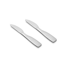 Two polished stainless steel Rio dinner knives with serrated edges and curved handles, arranged diagonally on clean white background.