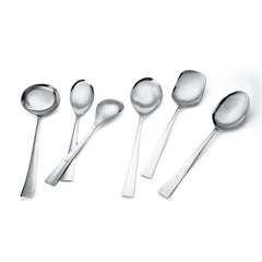 FNS Slim Line serving spoon set artistically arranged showing gravy ladle, rice server, and serving spoons with elegant slim handles and mirror polish finish.