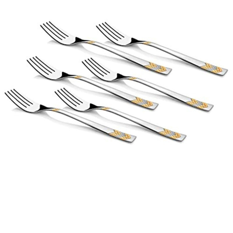 Six silver dinner forks with gold decorative patterns scattered on white background