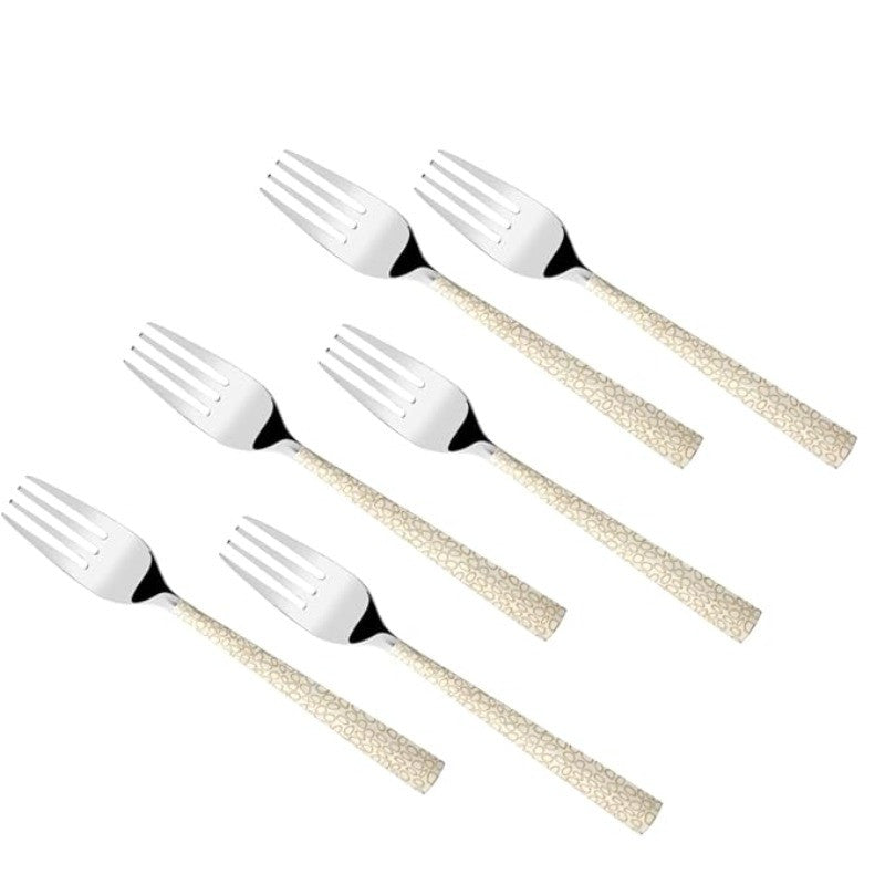 Six stainless steel forks with gold textured handles in arrangementRetry