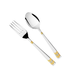 Stylish silver fork and spoon set with intricate gold chevron pattern on white background.