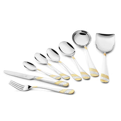 Eight-piece gold and silver cutlery set arranged on white background including spoons, knife, fork, ladle.
