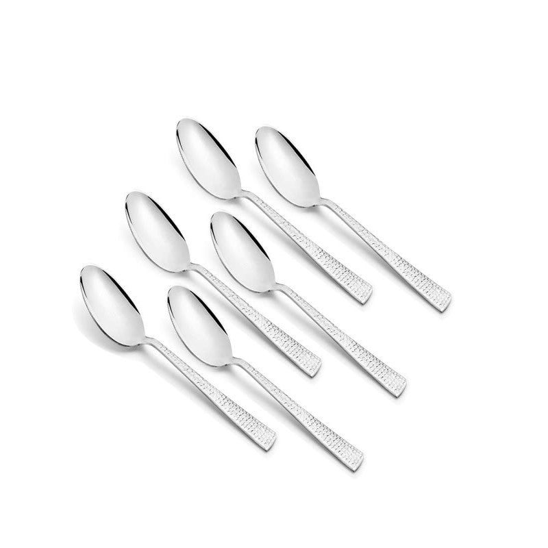Set of six teaspoons featuring oval bowls and dimpled stainless steel handles, aligned diagonally.