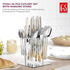 24-piece cutlery set with gold detailing arranged on a stand in a well-set dining environment.