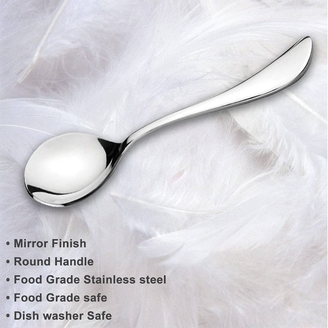 FNS Victoria serving spoon features infographic highlighting mirror finish, round handle, food grade stainless steel, food safe, and dishwasher safe on white fabric.