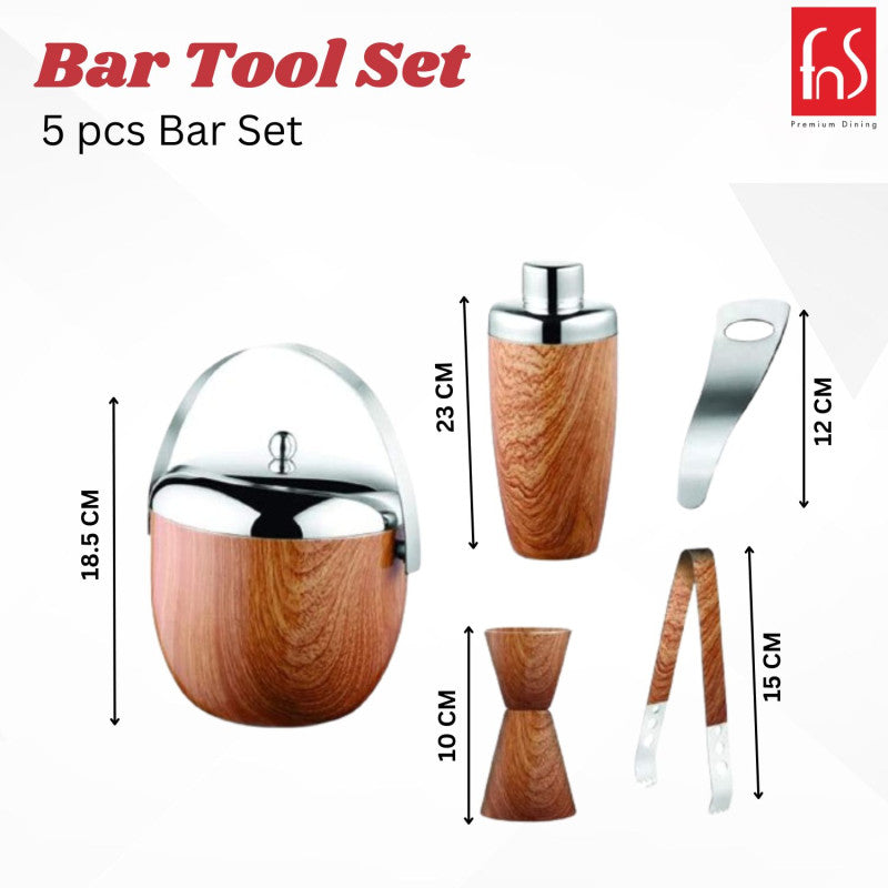 Product dimensions chart showing wooden bar set measurements: ice bucket 18.5cm, cocktail shaker 23cm, jigger 10cm, tongs 15cm, opener 12cm