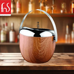 FNS wooden finish apple-shaped ice bucket with chrome lid and arched handle on rustic bar counter with bottle display background
