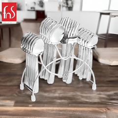 Stylish 24-piece stainless steel cutlery set in stand placed on wooden kitchen counter with FNS branding.