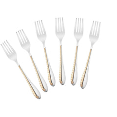 Six silver dinner forks with ornate gold beaded handle design displayed at slight angle