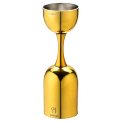Gold cocktail jigger standing upright showing 100ml marking, stainless steel interior rim, and polished gold exterior finish