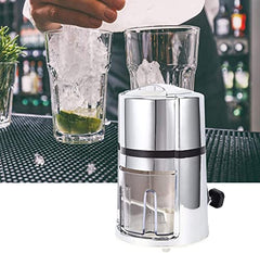 Bartender using hand crank ice crusher to make mojito at bar with garnished cocktail glasses
