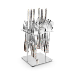Glossy cutlery set with multicolor patterned handles organized in a vertical silver stand on white background.