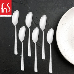 Six Helios stainless steel dessert spoons with distinctive textured handles arranged on white background, modern flatware design