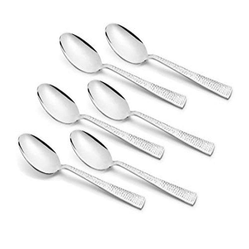 Six Helios stainless steel baby spoons with textured handles arranged in two rows on white background, premium baby feeding flatware