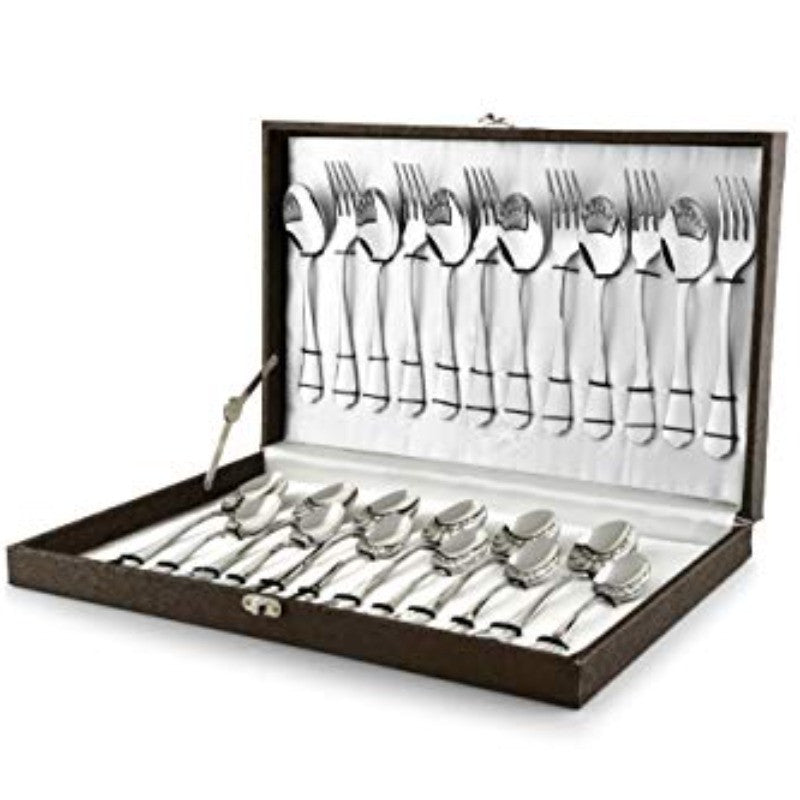 Elegant cutlery gift box opened to reveal neatly arranged set of spoons, forks, and knives.