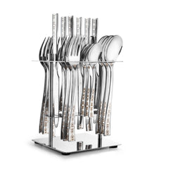 Elegant floral-etched silver cutlery set organized in a vertical chrome stand with polished base.