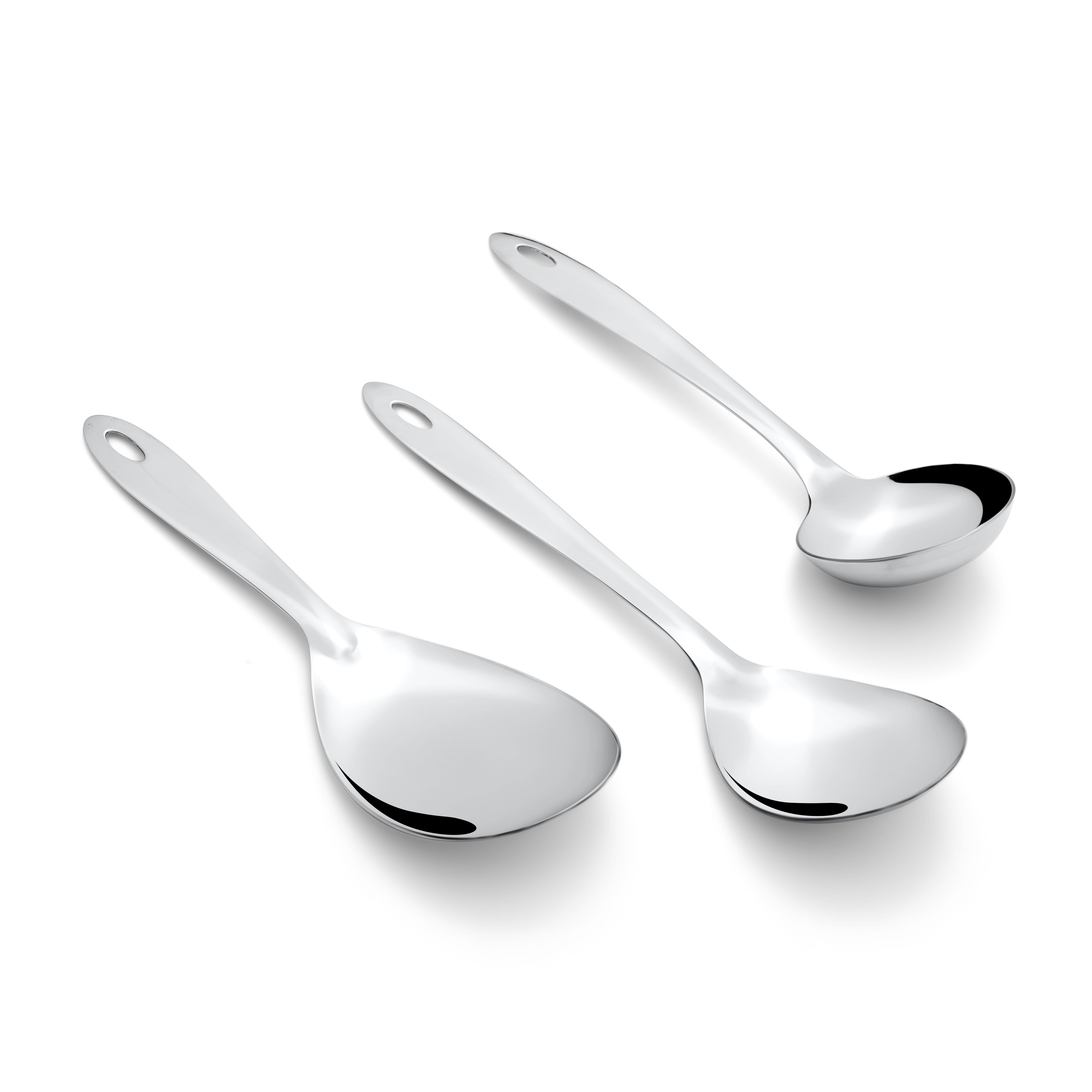 Montavo Amazon 3-piece stainless steel serving set scattered arrangement on white background showcasing rice server, veg spoon, and gravy ladle with oval handles