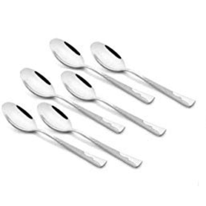 Six stainless steel teaspoons with hammered texture handles arranged diagonally on white background, showing mirror-finish bowls and contemporary design.