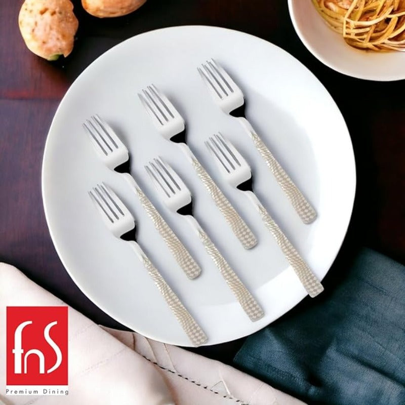 Six stainless steel forks with textured beige handles arranged on white plate
