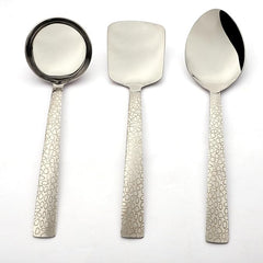 Montavo Pebble 3-piece stainless steel serving set including ladle, turner, and spoon with decorative laser engraved pebble texture