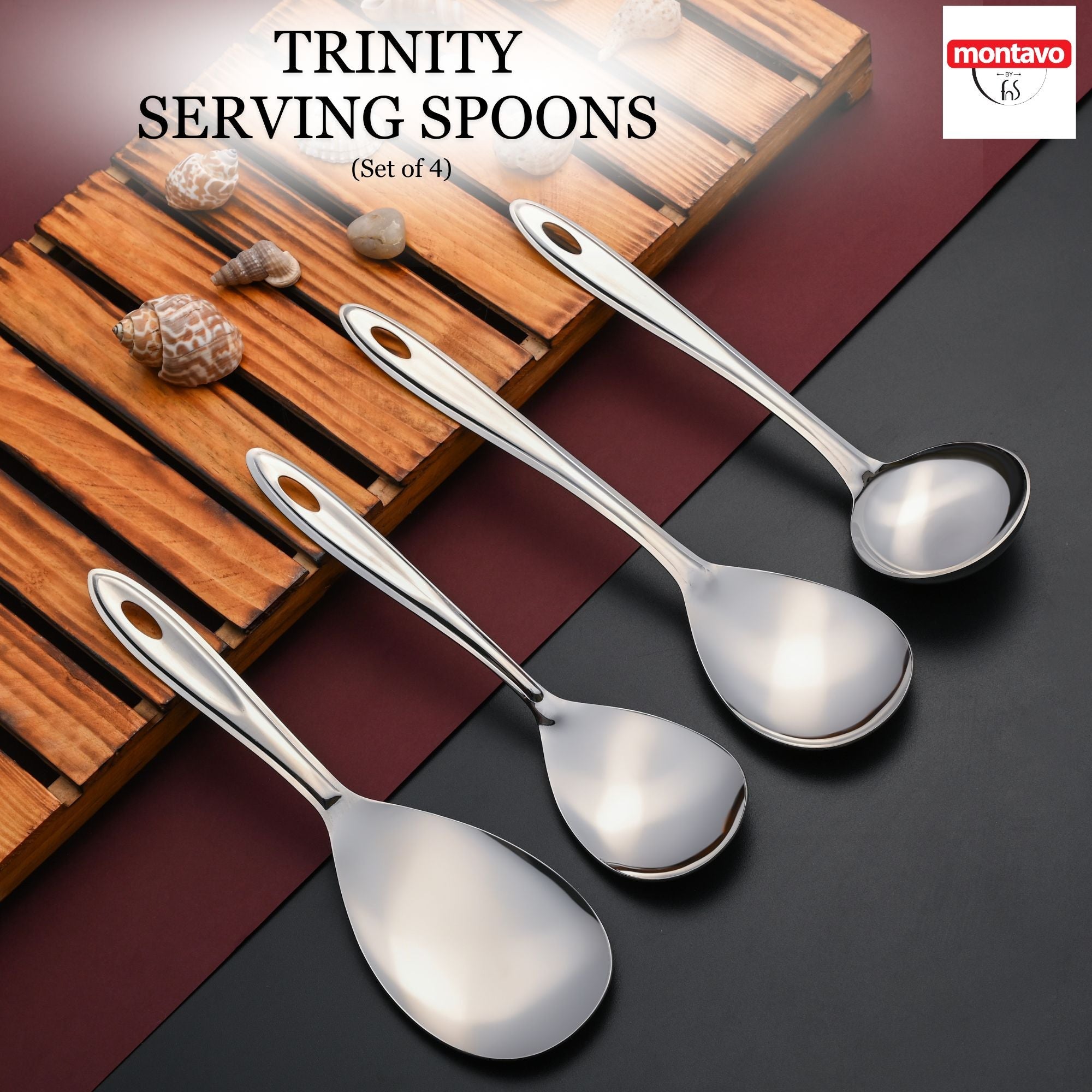 Trinity serving spoons set displayed on wooden holder with polka dot napkin, circular wooden plate, and grey background styling.