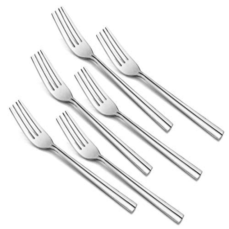 Six Nile stainless steel dinner forks with modern tapered handles arranged diagonally on white background, premium flatware