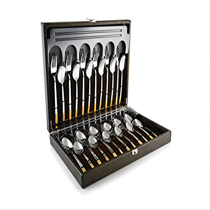 Complete gold-handled cutlery set in storage box shown open against a clean white background.