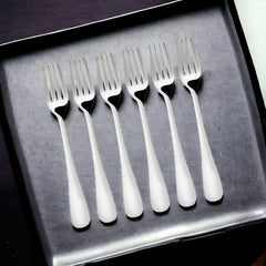 Six stainless steel forks arranged in black presentation box
