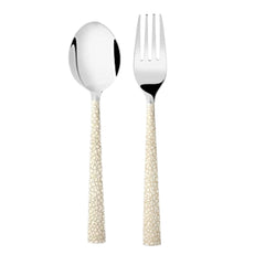 Fork and spoon with ivory-colored textured handles, standing upright on a white background.