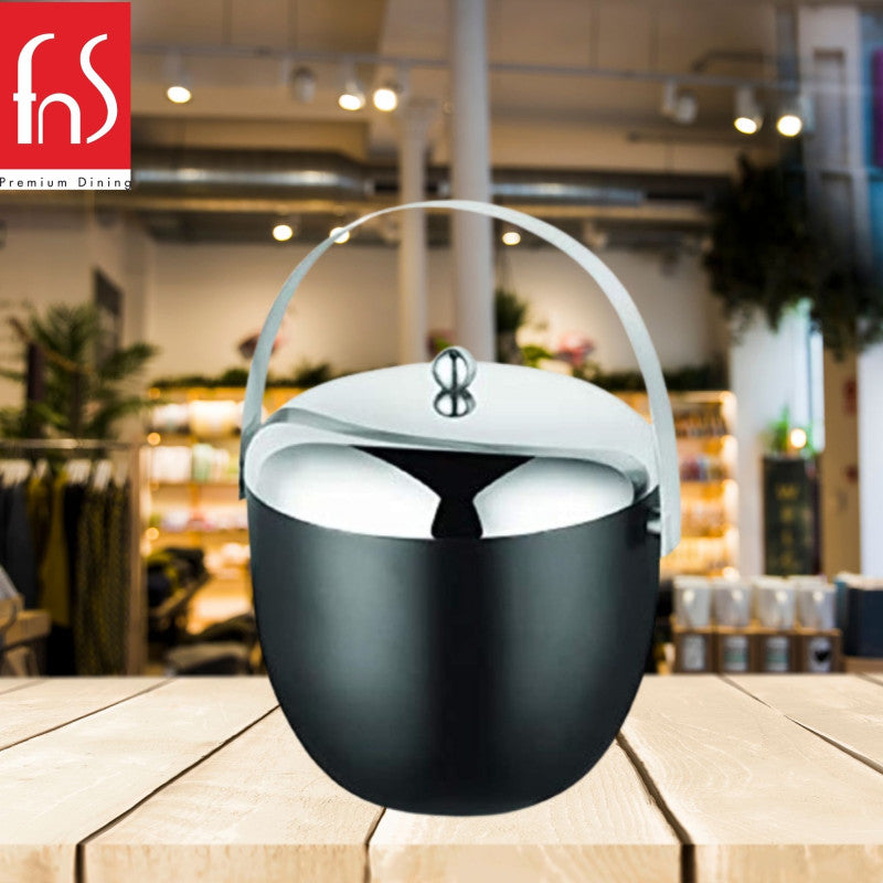 Premium ice bucket displayed on wooden table in restaurant or bar setting with blurred dining area in background