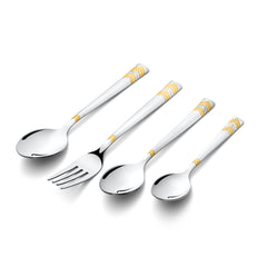 Spoon, fork, and two sizes of spoons with gold-accented handles laid diagonally on white.