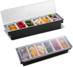 Two stackable condiment organizers with six compartments each, filled with colorful fresh fruits including lemons, cherries, limes, cheese, oranges, and berries with clear lids