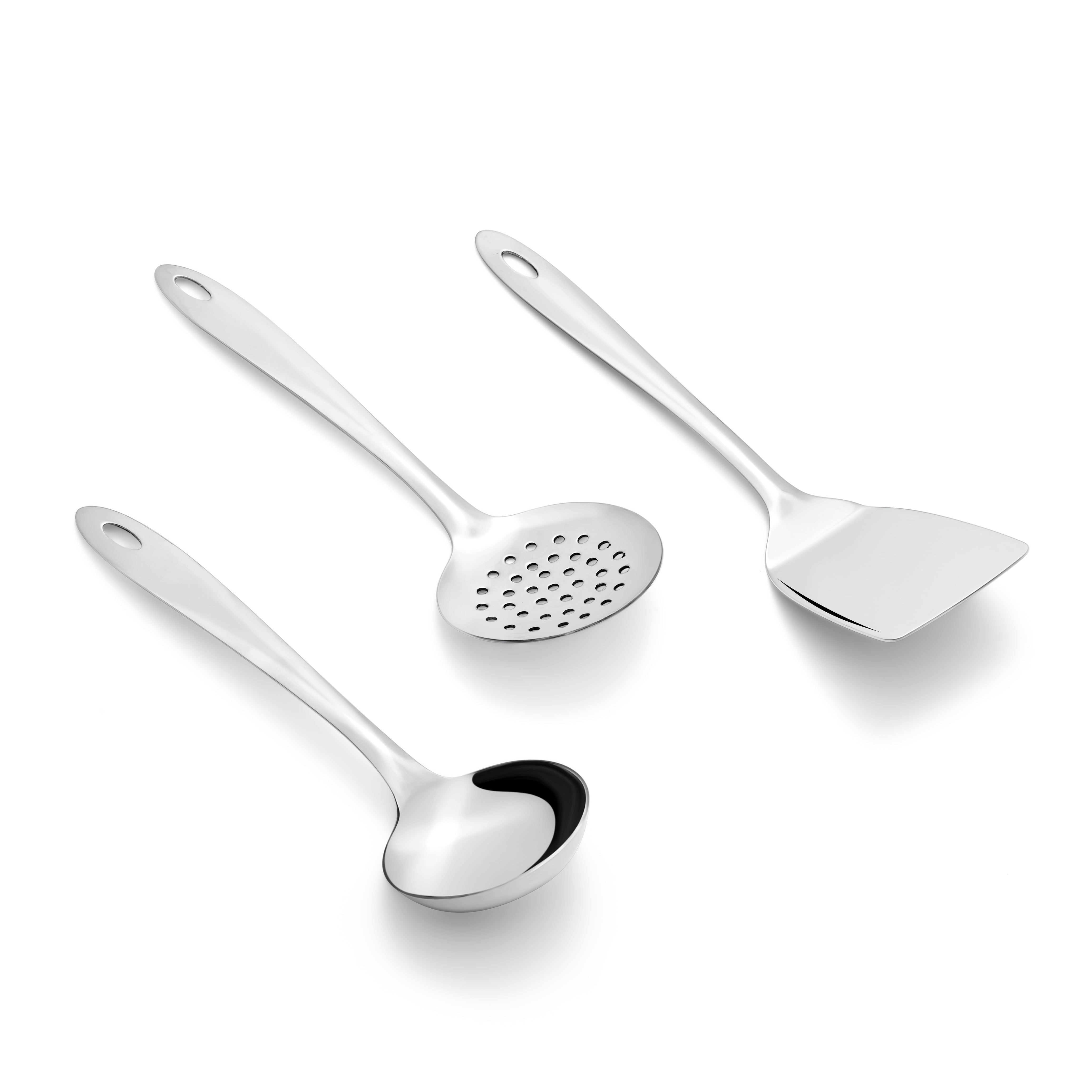 Stainless steel Amazon serving set with gravy ladle, perforated skimmer, and flat spatula on white background diagonal view