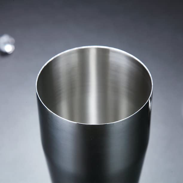 Interior view of stainless steel cocktail shaker opening showing smooth polished interior surface