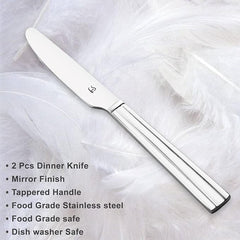 Mirror finish stainless steel dinner knife with tapered handle displaying key features: food-grade safe, dishwasher safe, and durable construction on marble background.