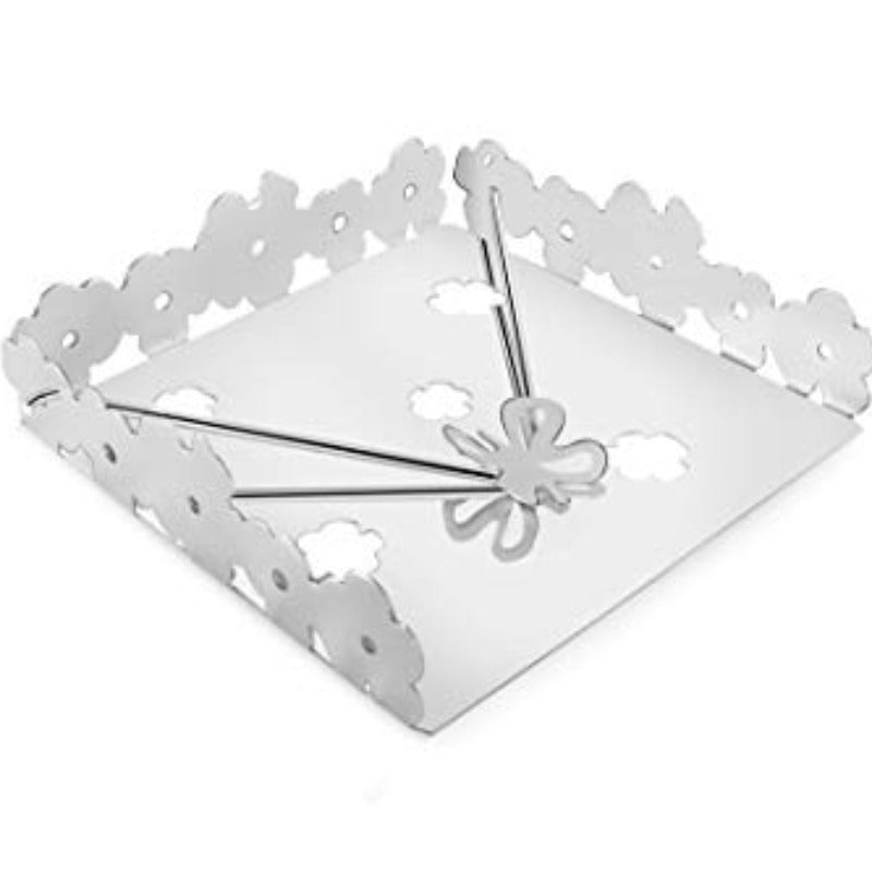Stainless steel square napkin holder with floral cutout border design and center spring clip mechanism, on white background