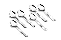 Six shiny stainless steel tablespoons with grooved design handles shown on a plain white background.