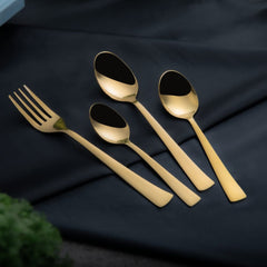 Top-down view of Gold 24 Piece Cutlery Set organized in the box